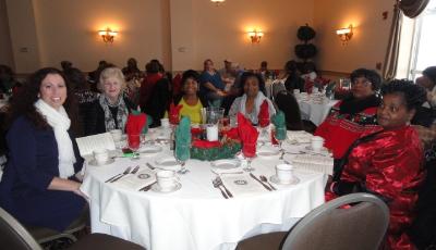 Foster grandparents and guests enjoy the luncheon.