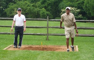 John Durning and Ernie Brown compete in Men's Horseshoes.