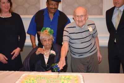 Agnes Nelson, 108, of Broomall Rehabilitation & Nursing Center in Marple Township and Sye Brandman, 103, of Philadelphia, oldest party guests, cut the ceremonial birthday cake.