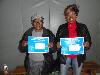 Doris Burgess (left), of Lansdowne, and Betty Whitehead (right) of Drexel Hill, display their raffle prizes- $125 PECO vouchers to be used toward utility payment.