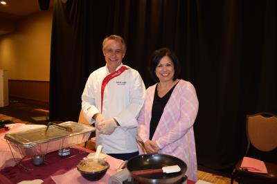 Mercy Fitzgerald sponsored a cooking demo with Executive Chef, David Judge,  who prepared a Mediterranean Chicken Taco on a warm flour tortilla. Pictured are Chef David Judge and Laureen Carlin, of Mercy Fitzgerald.