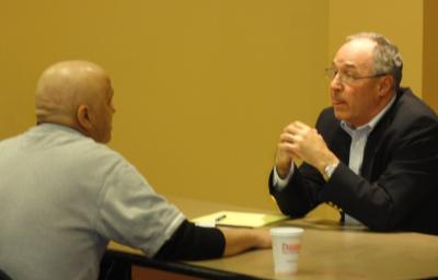 Robert Breslin, elder law attorney from Pappano and Breslin law firm, meets with client to prepare simple will, living will, and power of attorney.