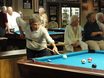 Lining up the shot in Women's Billiards