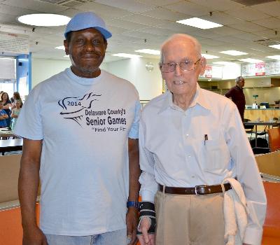 Ronald Worthy and partner,Richard Bayley, compete in Double's Bowling.