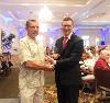 Fit for Life winner, John Iannotti, is presented his award by Stephen Gamble, co-chair of the Delaware County Senior Games.
