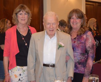 center: Eugene Vickers, age 103